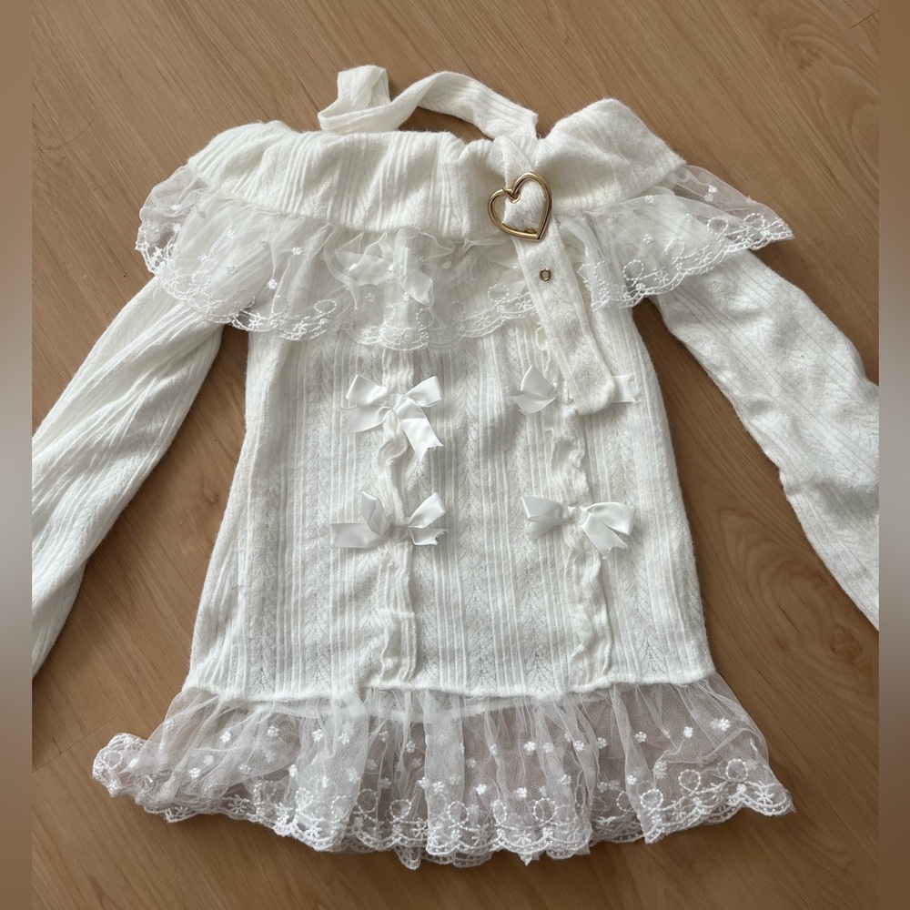 White coquette off the shoulder lace sweater